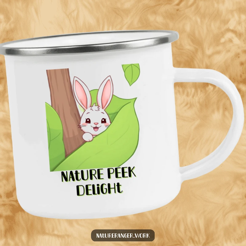 Funny camping mug showing a playful cartoon rabbit peeking from behind a large forest leaf, perfect for forest exploration.